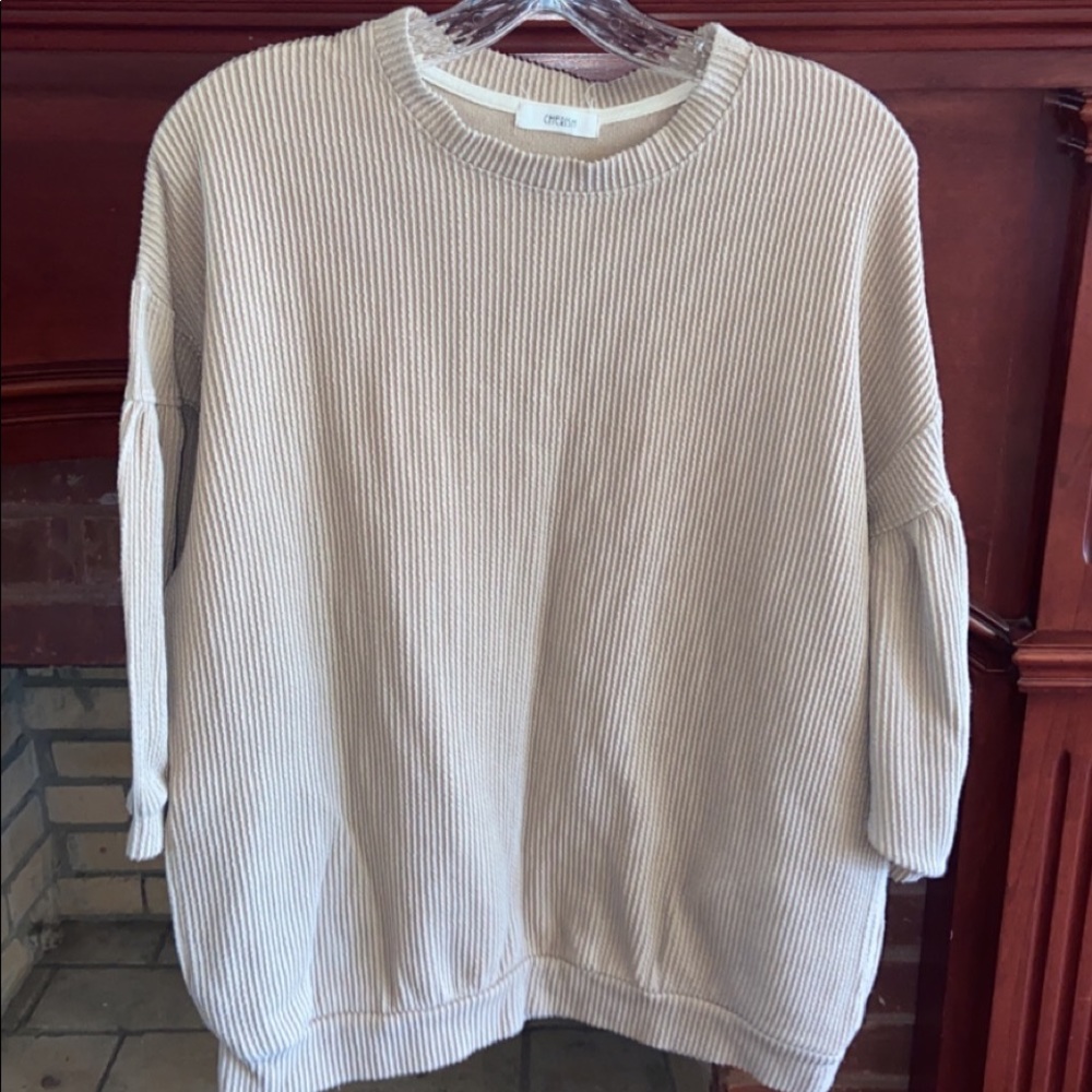 Cherish sweater with puffy sleeves and pockets size m/L